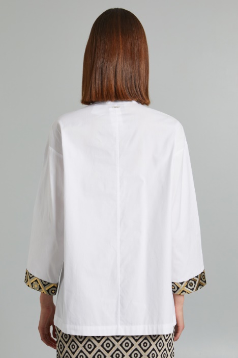 Blusón con puños de jacquard