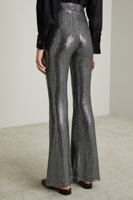 Pantaloni flare con paillettes