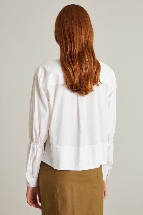 Blusa con collo a coulisse