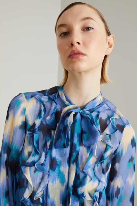 Blusa in chiffon con volant