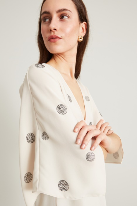 Blusa lunga con strass
