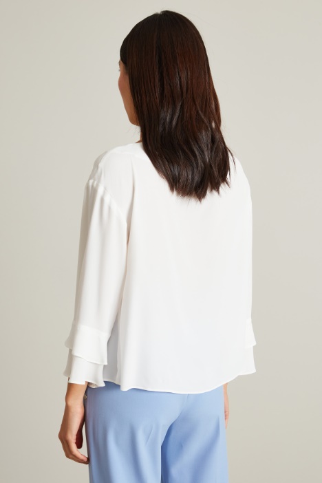 Blusa con volant