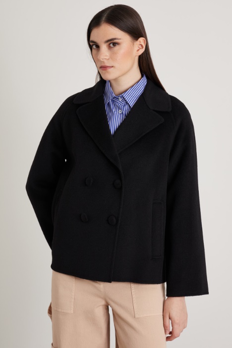 Abrigo con botones forrados