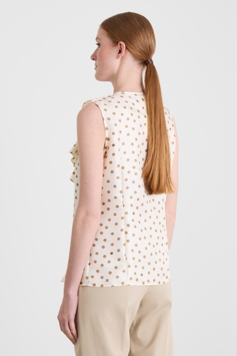 Top de seda con volantes