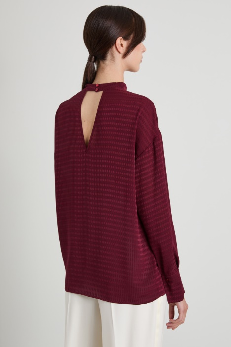 Blusa in tessuto fluido