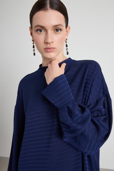 Blusa de tejido fluido