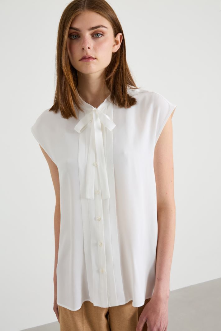 Blusa senza maniche