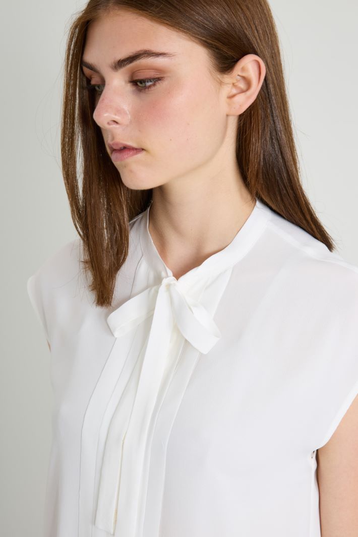 Blusa senza maniche
