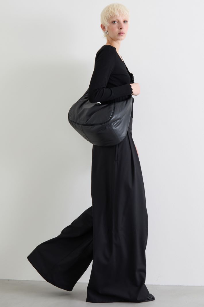 Pantaloni con baschina in maglia
