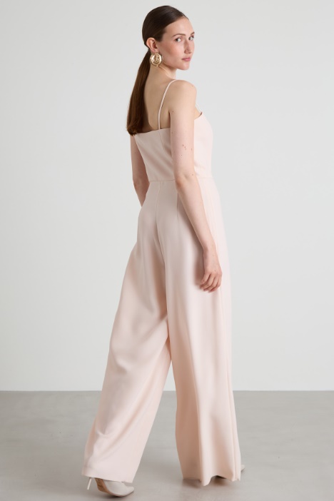 Tuta con coprispalle