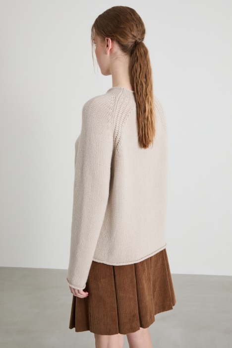 Suéter con detalle de trenza