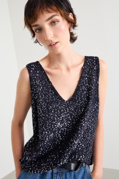 Top in maglia con paillettes