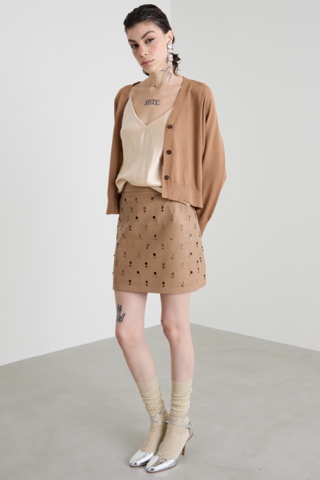 Short, nappa leather skirt with rhinestones Intrend