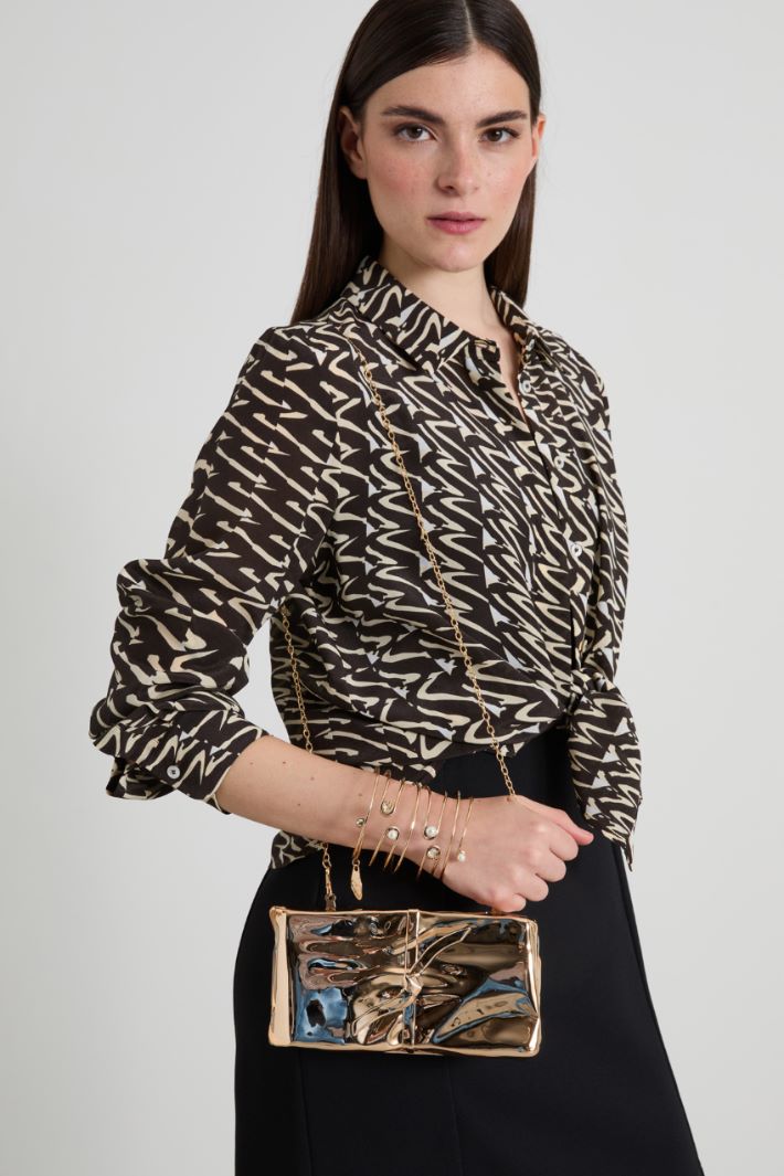 Clutch with a metallic finish Intrend - 3