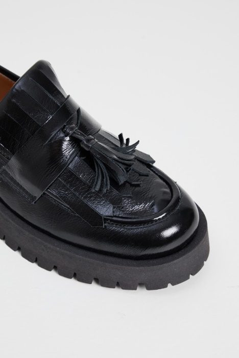 Mocassini con frange e nappe