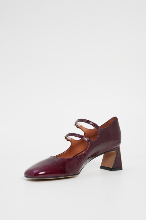 Décolleté in vernice con cinturini