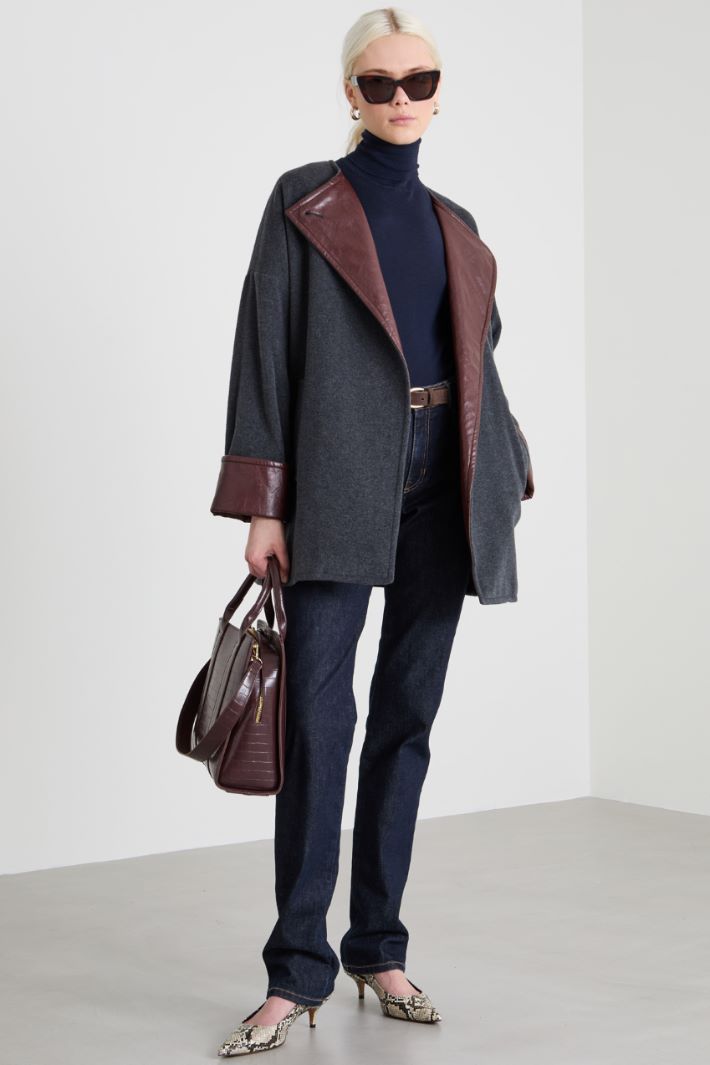 Pea coat with faux leather inserts Intrend