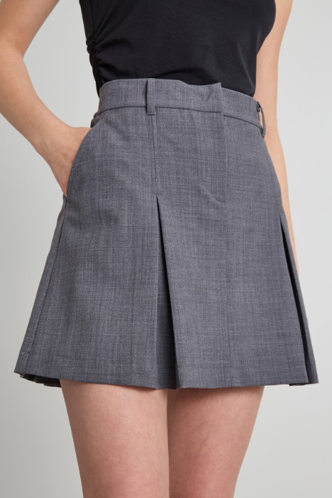 Gonna corta a pieghe