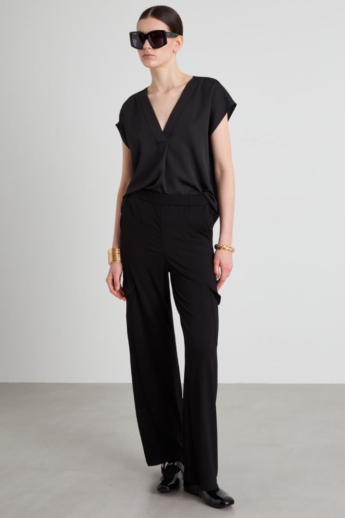 Blusa con pliegues doblados