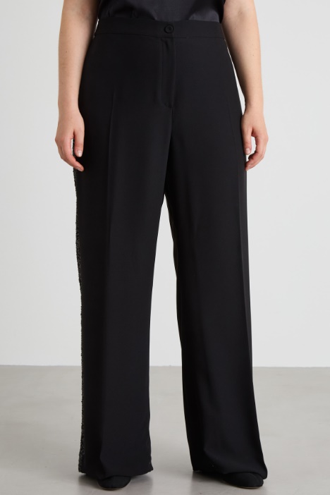 Pantaloni con bande di paillettes