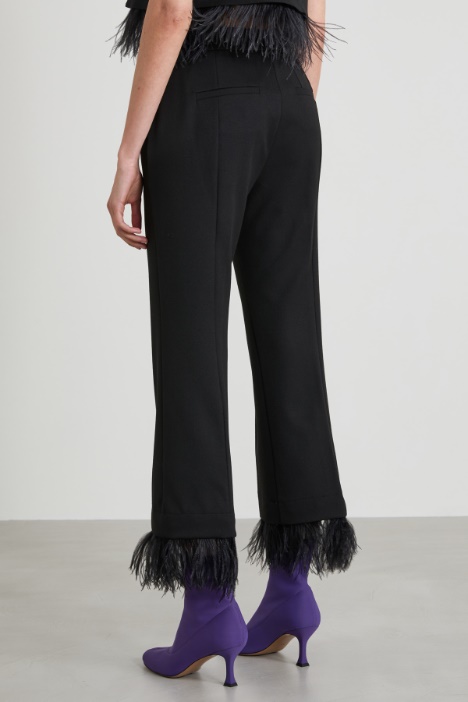Pantaloni con piume