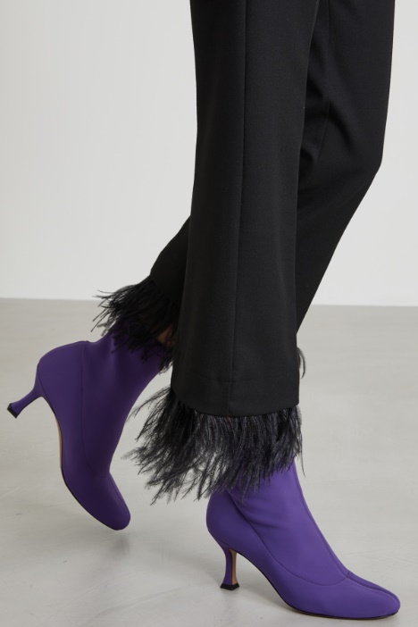Pantaloni con piume