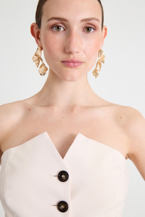 Top smanicato in lana