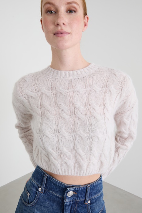 Maglia cropped a trecce