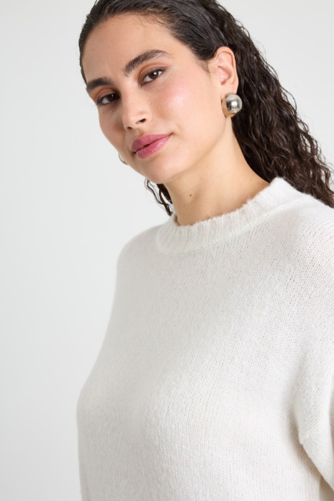 Maglia con frange al fondo