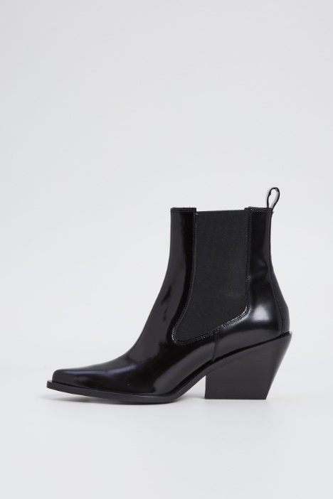 Texani in pelle lucida