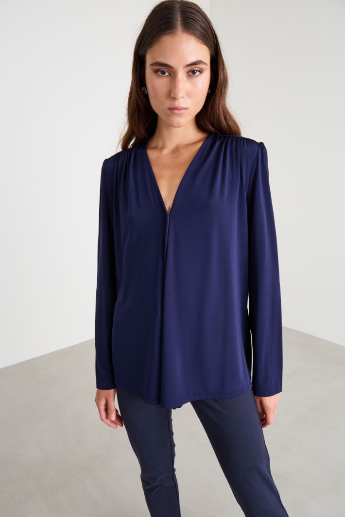Blusa con nastro a fiore Intrend