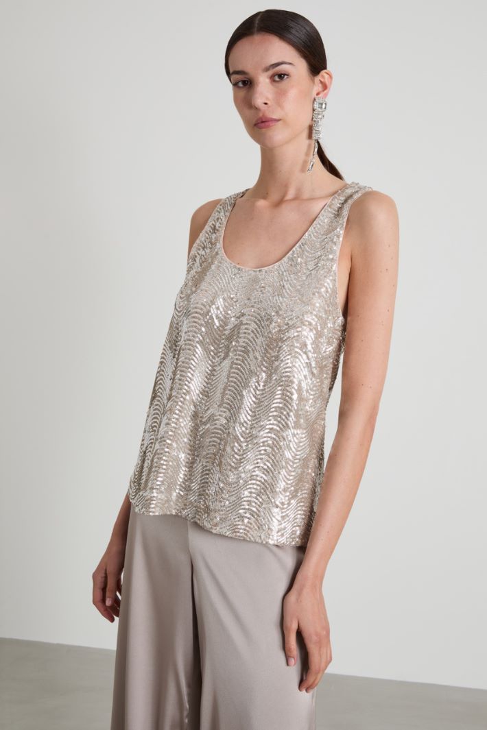 Top smanicato con paillettes Intrend