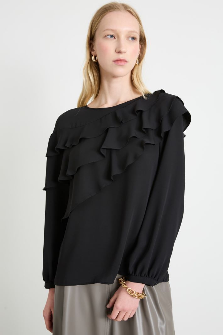 Blusa con volant Intrend