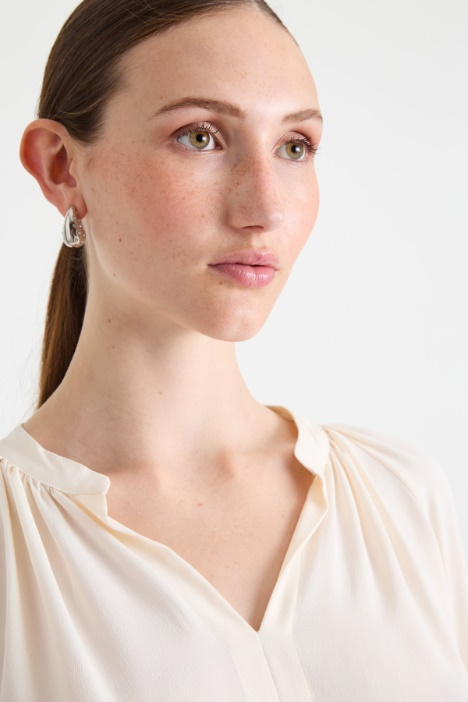 Blusa con arricciature