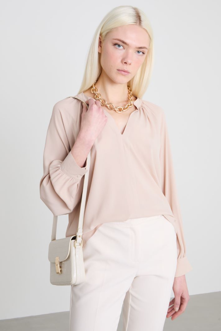 Blusa con arricciature