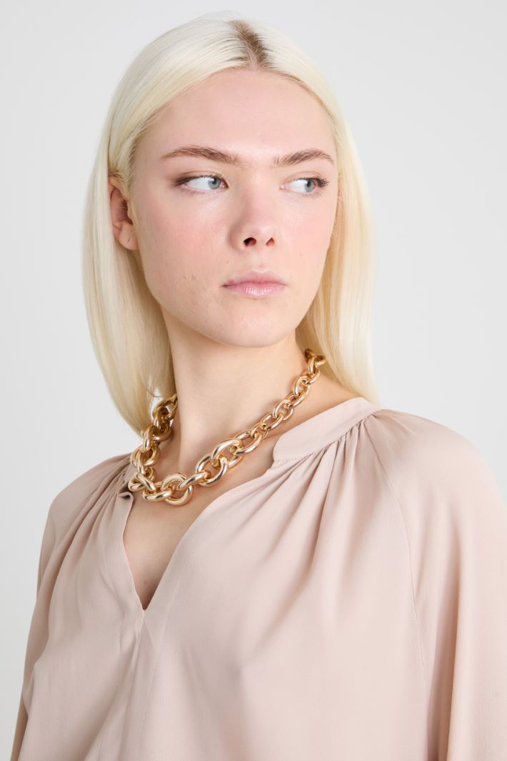 Blusa con arricciature