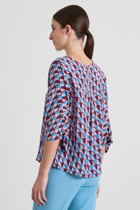 Blusa girocollo in crépe