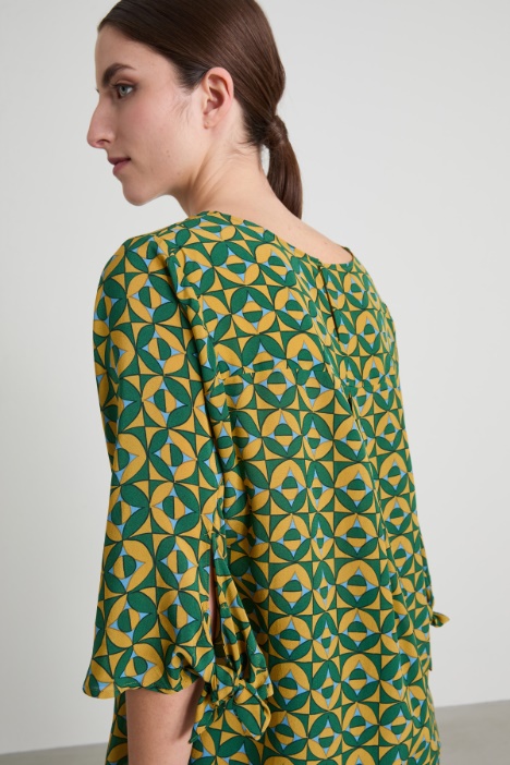 Blusa girocollo in crépe