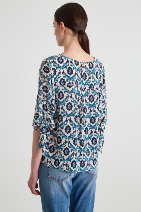 Blusa girocollo in crépe
