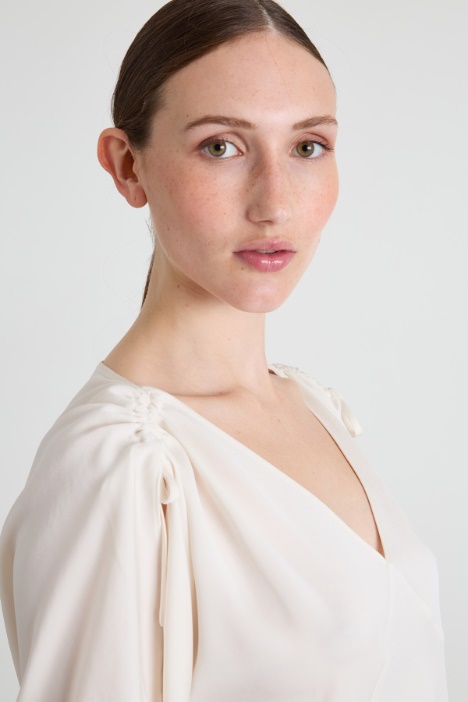 Blusa in tessuto fluido