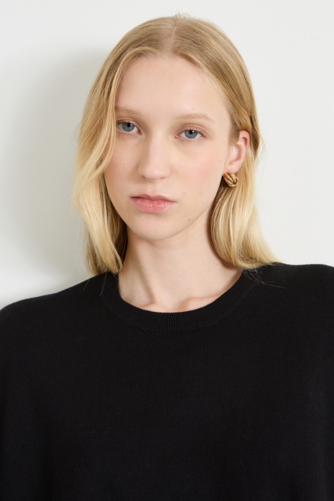 Suéter de bajo redondeado