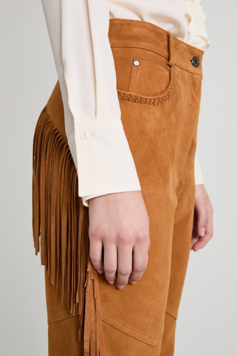 Pantaloni flare con frange
