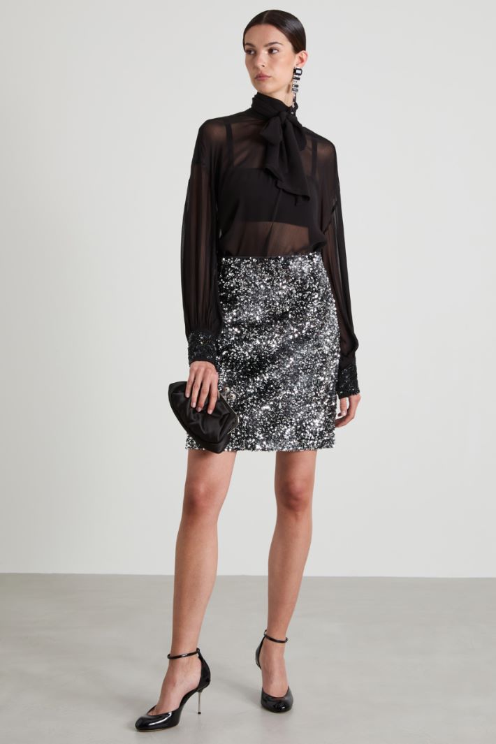 Minigonna con paillettes Intrend
