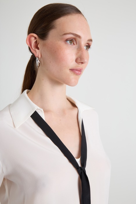 Blusa in seta con fusciacca