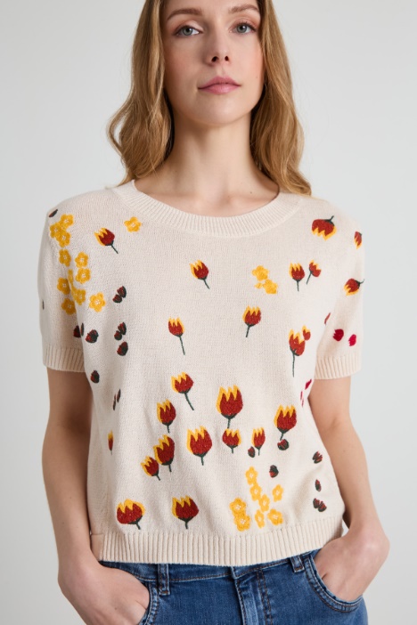Maglia con ricami floreali