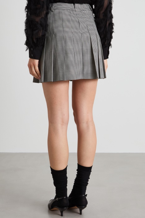 Gonna corta a pieghe