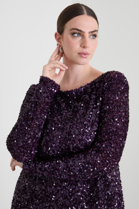 Abito svasato con paillettes