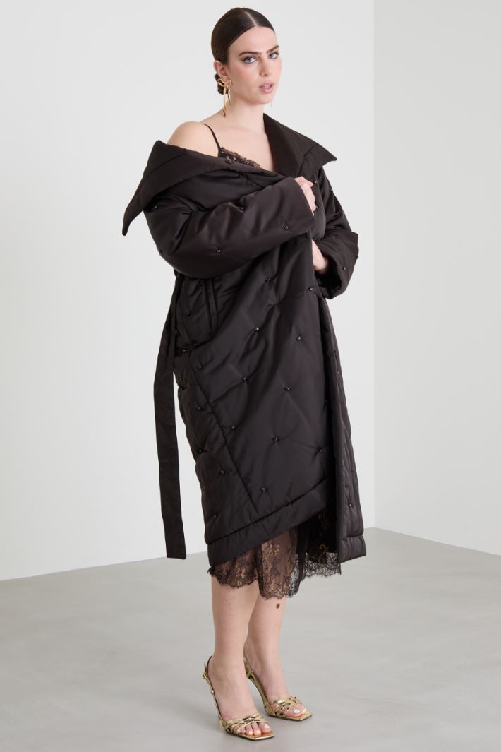 Long padded coat with rhinestones Intrend