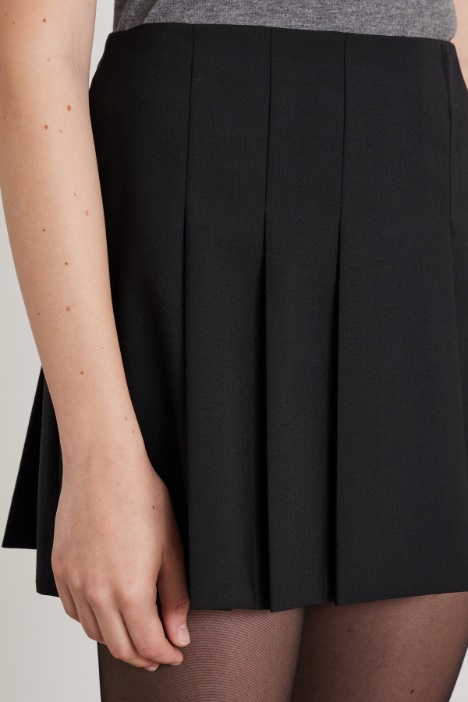 Minigonna con pieghe