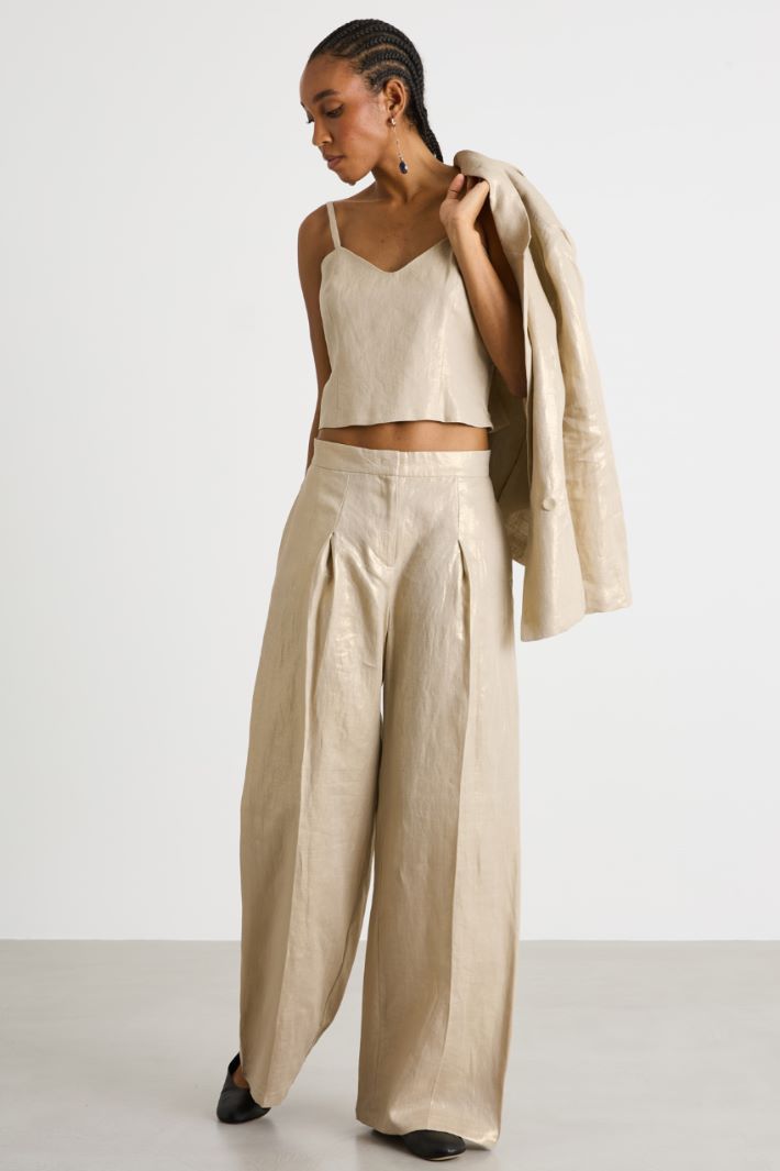 Wide-leg trousers in laminated canvas Intrend